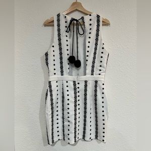 Adorable Backless Mini Dress with Pom Poms